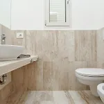 Pellicano أولبيا